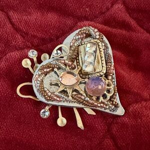 Elegant Heart-Shaped Brooch with Gold and Silver Accents